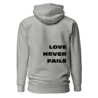 Unisex Love Never Fails Hoodie (black lettering)